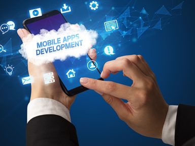 Gyaaninfo app development Madurai team working on mobile design